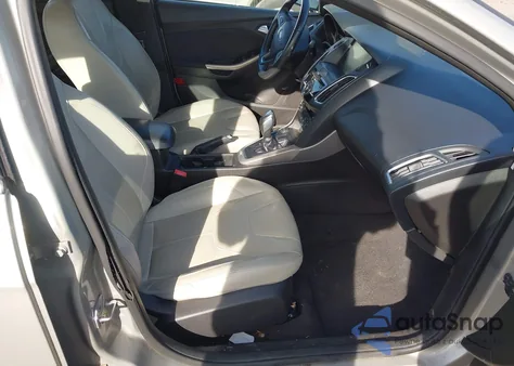 2015 Ford Focus Titanium из США, поврежденный, VIN 1FADP3J23FL373450